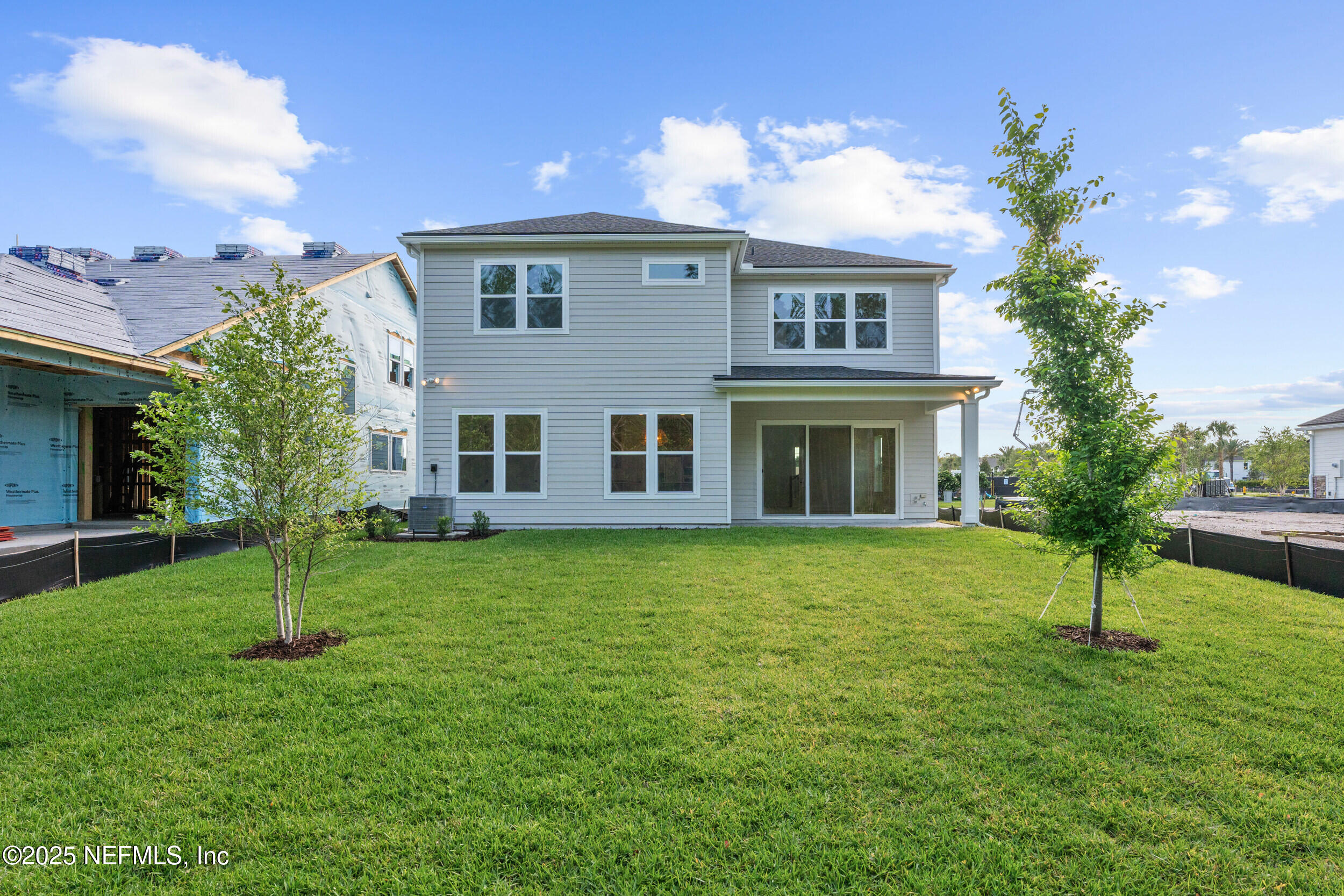 103 Reflections Avenue Ponte Vedra, FL 32081 - Photo 37 of 38 a view of a house with a yard