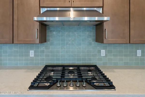 a kitchen with a stove