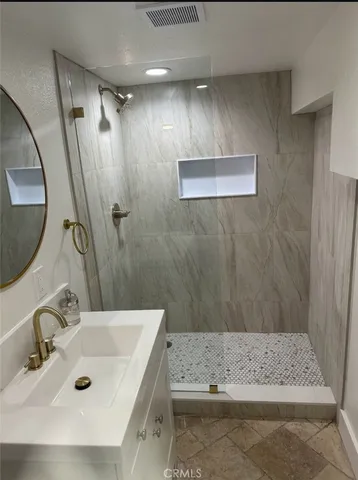a picture of a bathtub in a bathroom
