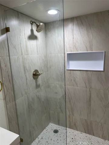 a view of a backyard of the house