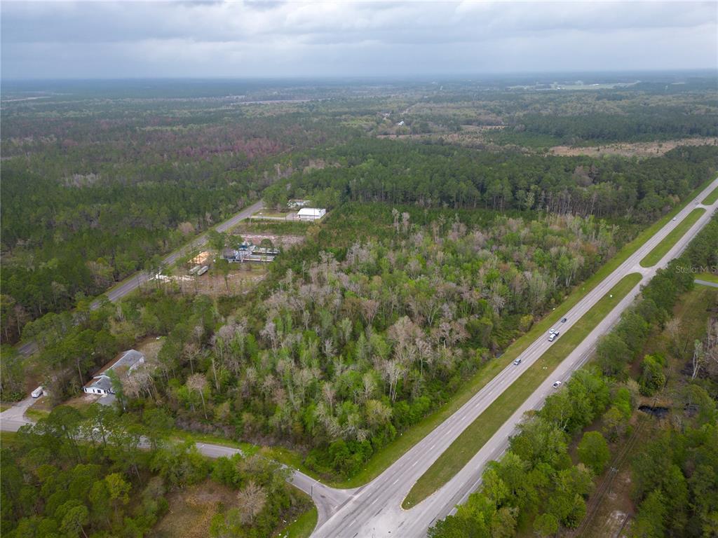 Tbd Northeast Waldo Road Gainesville, FL 32609 - Photo 2 of 10 a view of a lake from a balcony