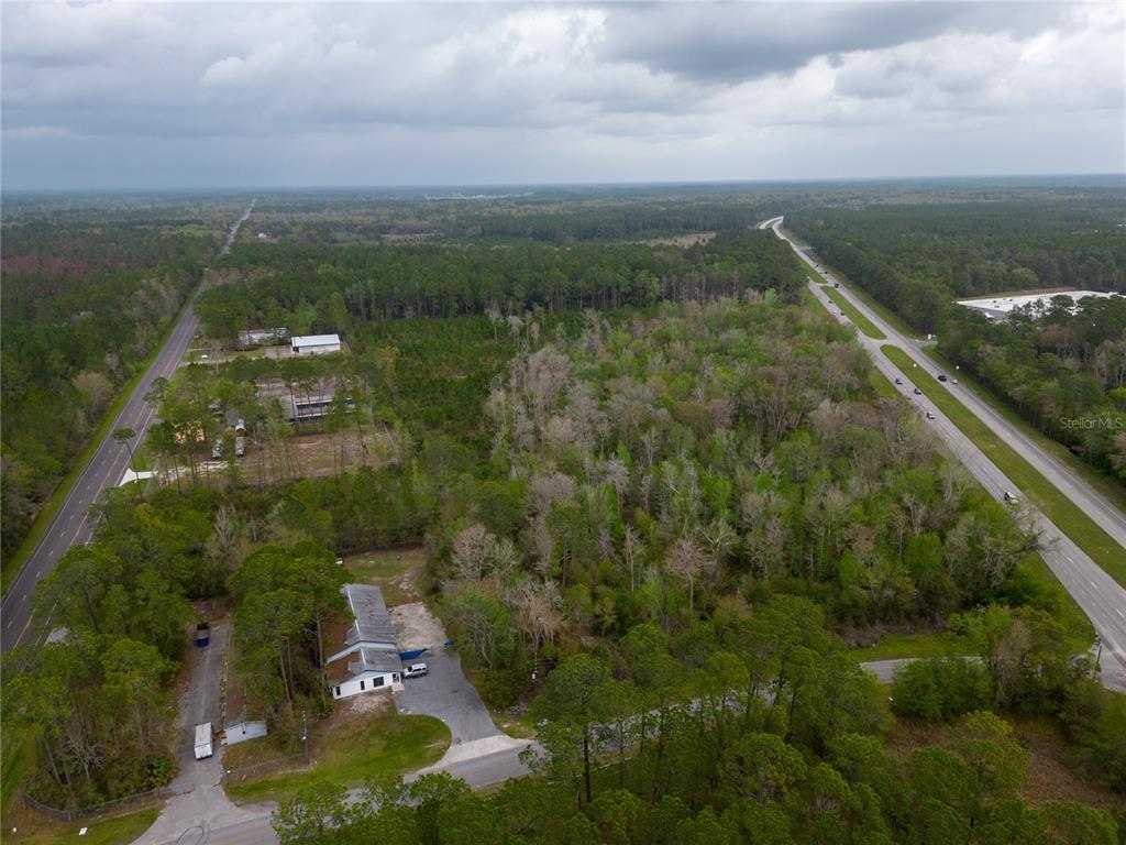 Tbd Northeast Waldo Road Gainesville, FL 32609 - Photo 5 of 10 a view of a lake with a city