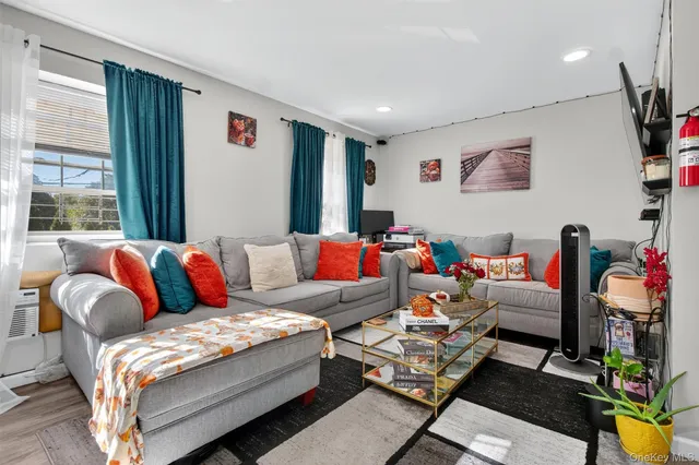 a outdoor dining space with furniture and a potted plant