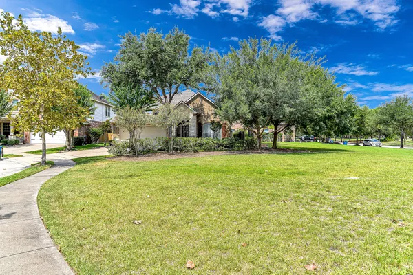 a swimming pool with outdoor seating and yard