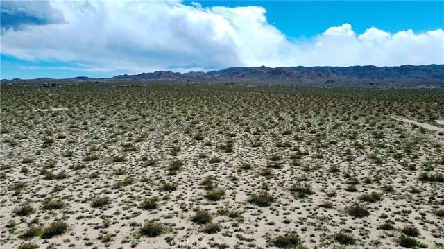 a view of a lake with a mountain in the background