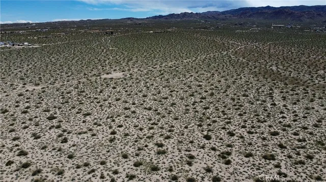 a view of a city with mountain