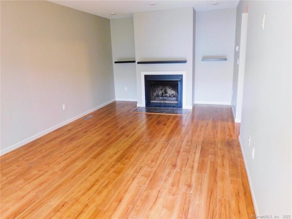 600 Cypress Road, Unit 600 Newington, CT 06111 - Photo 1 of 1 Living Room with fireplace