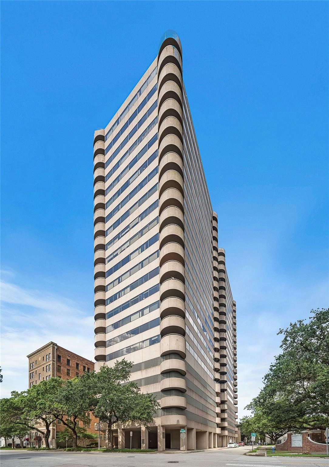 5000 Montrose Boulevard, Unit 14H Houston, TX 77006 - Photo 1 of 40 a view of a tall building