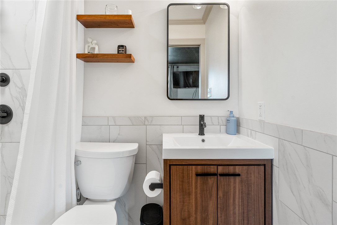 4508 Old Williamston Road Belton, SC 29627 - Photo 17 of 47 The sleek updated bathroom features contemporary fixtures.