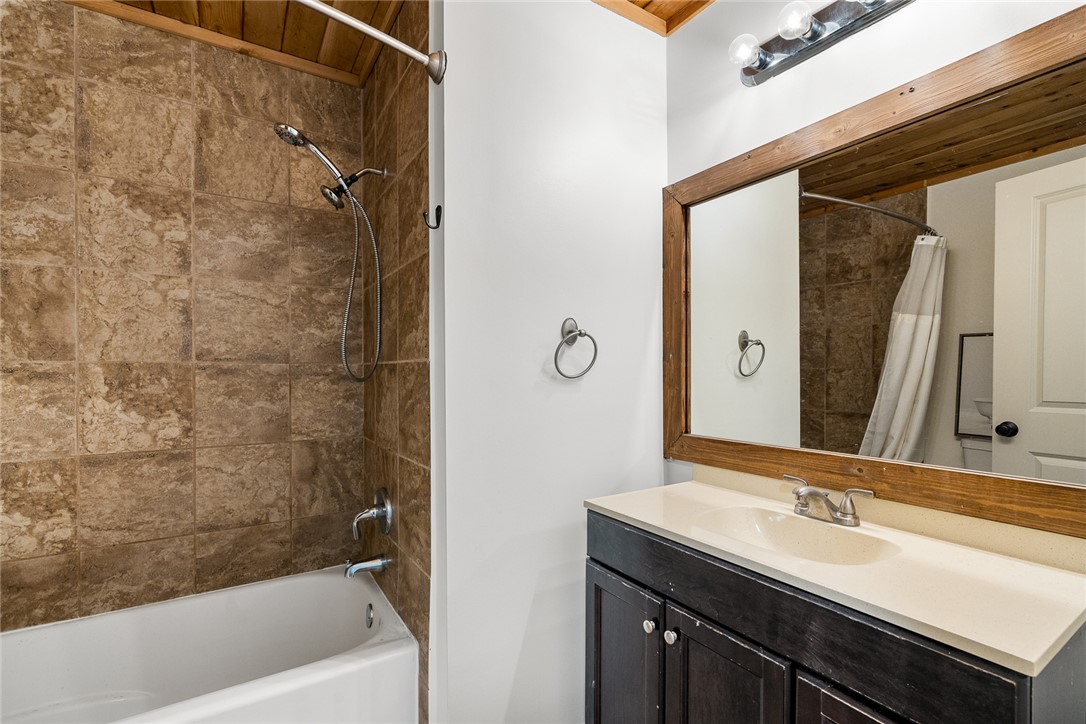 4508 Old Williamston Road Belton, SC 29627 - Photo 21 of 47 This clean bathroom features a spacious bathtub and a wide mirror over the vanity.