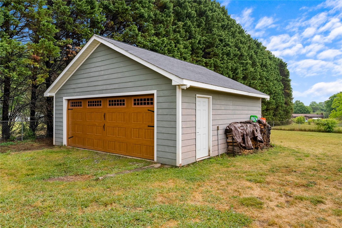 4508 Old Williamston Road Belton, SC 29627 - Photo 28 of 47 A well-maintained detached garage with ample space and easy access to the yard.