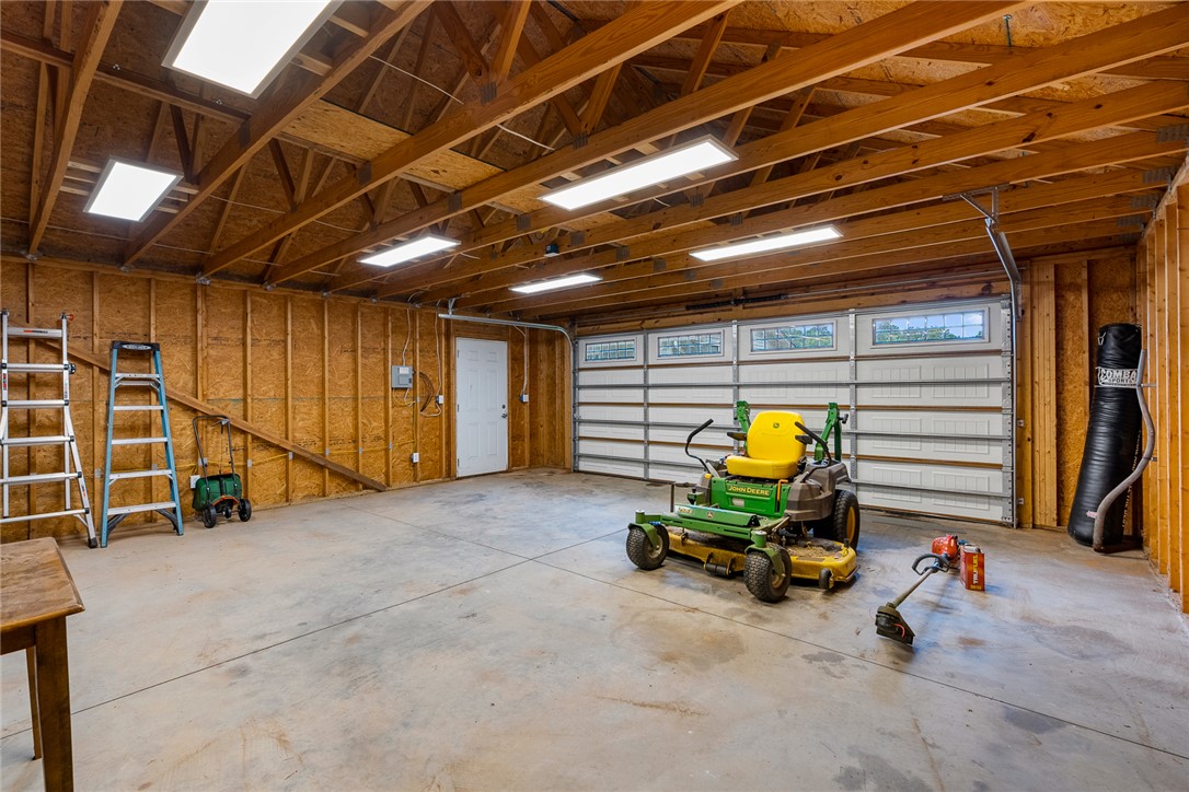 4508 Old Williamston Road Belton, SC 29627 - Photo 30 of 47 The second garage offers ample storage and features convenient overhead lighting and a durable concrete floor.