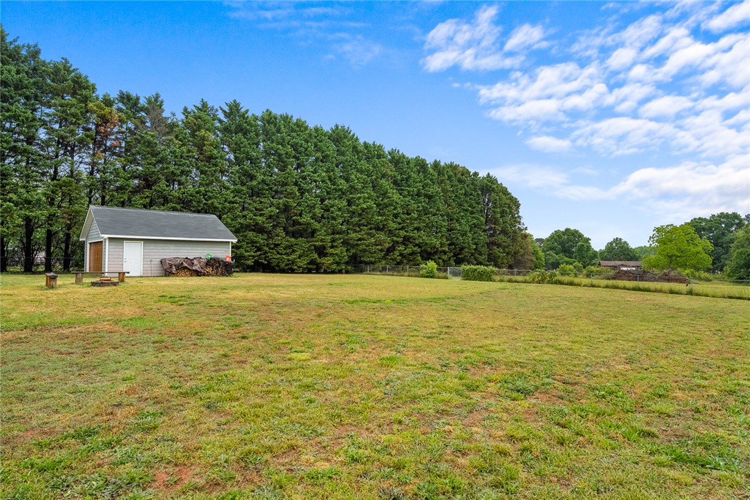 4508 Old Williamston Road Belton, SC 29627 - Photo 34 of 47 The yard offers fenced-in outdoor living space, perfect for recreation, entertainment and relaxation.