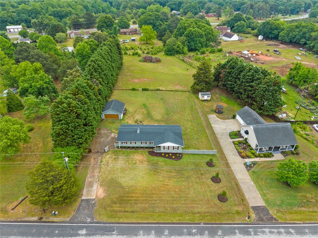 4508 Old Williamston Road Belton, SC 29627 - Photo 40 of 47 This expansive aerial view showcases a welcoming residence and lovely landscape.