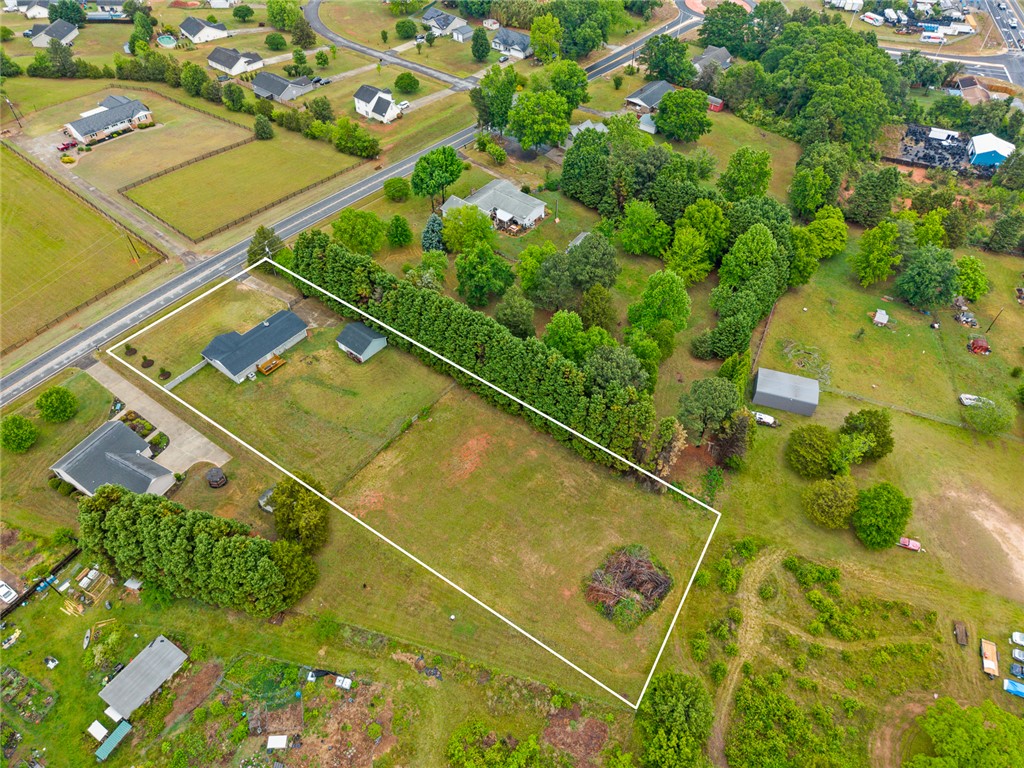 4508 Old Williamston Road Belton, SC 29627 - Photo 45 of 47 An aerial view showcases property lines with ample space and mature trees.