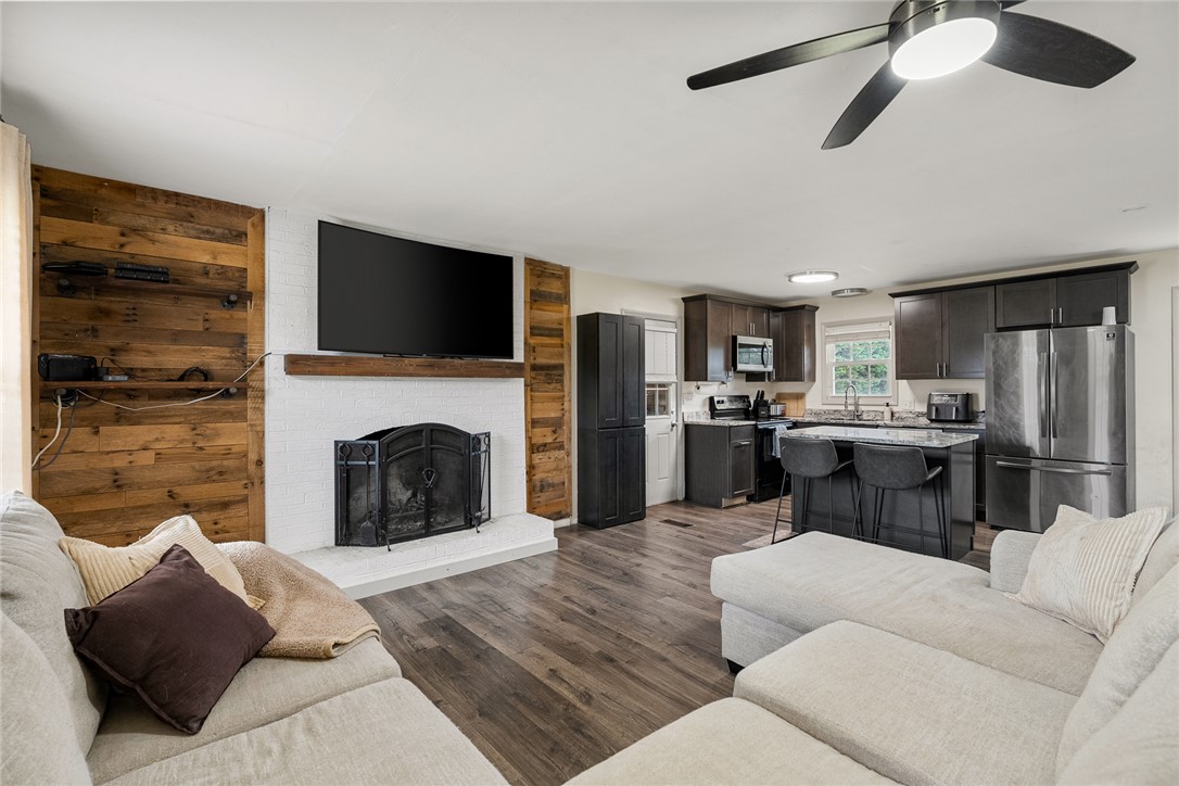 4508 Old Williamston Road Belton, SC 29627 - Photo 6 of 47 This living area seamlessly blends comfort with a functional kitchen space.