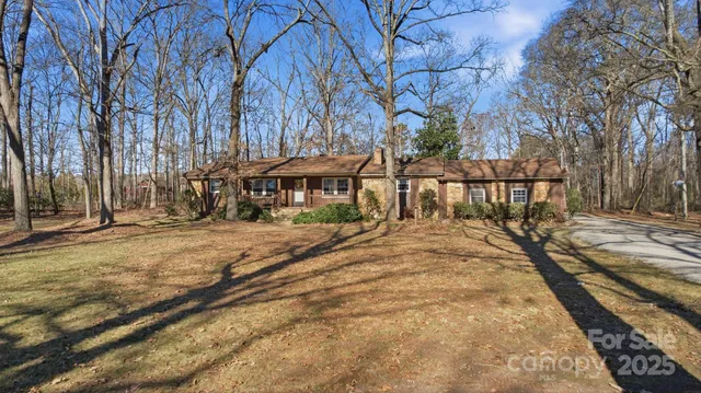 a view of a house with snow on the ground