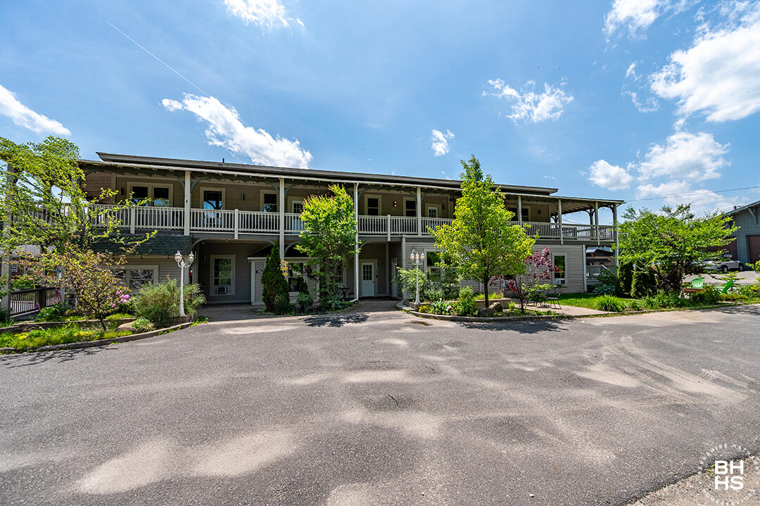 6143 Sentinel Road, Unit # 1 Lake Placid, NY 12946 - Photo 13 of 19 DownhillCondos_Summer_Exterior_L