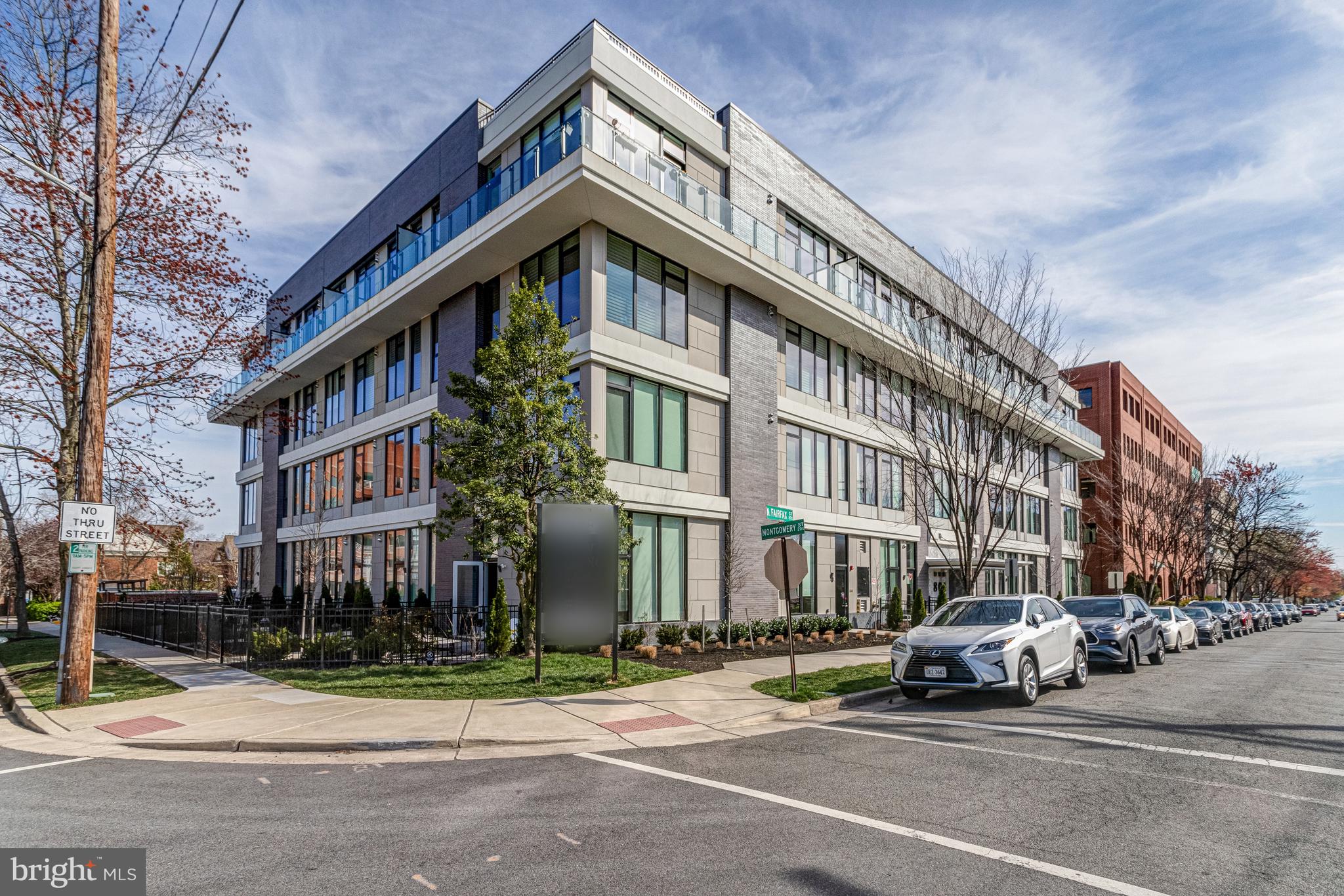 801 North Fairfax Street, Unit 314 Alexandria, VA 22314 - Photo 1 of 61 a car parked in front of a building