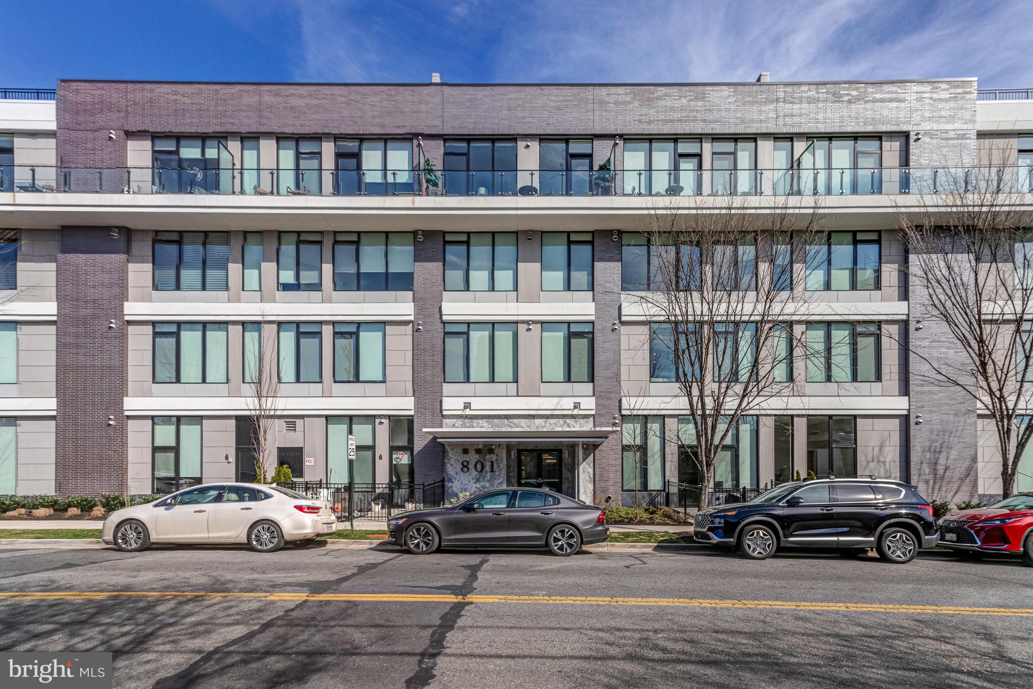 801 North Fairfax Street, Unit 314 Alexandria, VA 22314 - Photo 2 of 61 a view of building with parking area