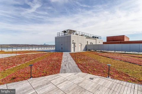 a view of a building with sitting area