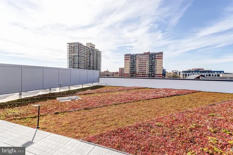 a view of a chairs and table in a patio