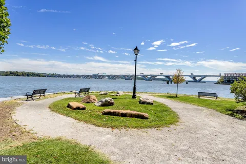 a view of a chairs and tables in patio of the house
