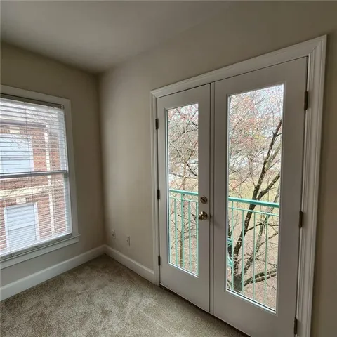 a bathroom with a sink a mirror and a toilet