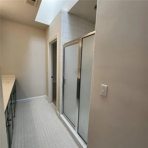 a view of a room with racks on the wall