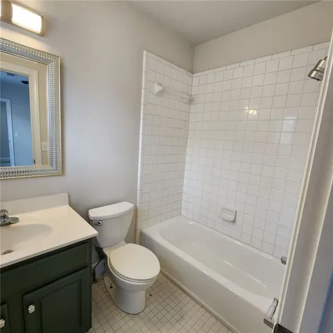 a view of a room that has a window in it