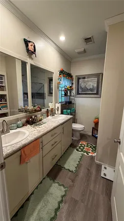 a kitchen with sink refrigerator and microwave