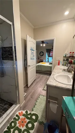 a kitchen with a sink and a stove top oven