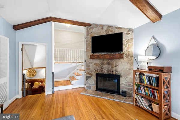 a view of staircase with white walls
