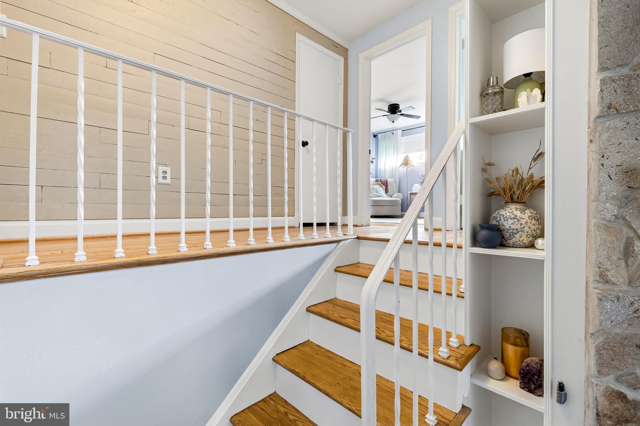 6745 Glenkirk Road Baltimore, MD 21239 - Photo 13 of 35 a view of staircase with white walls