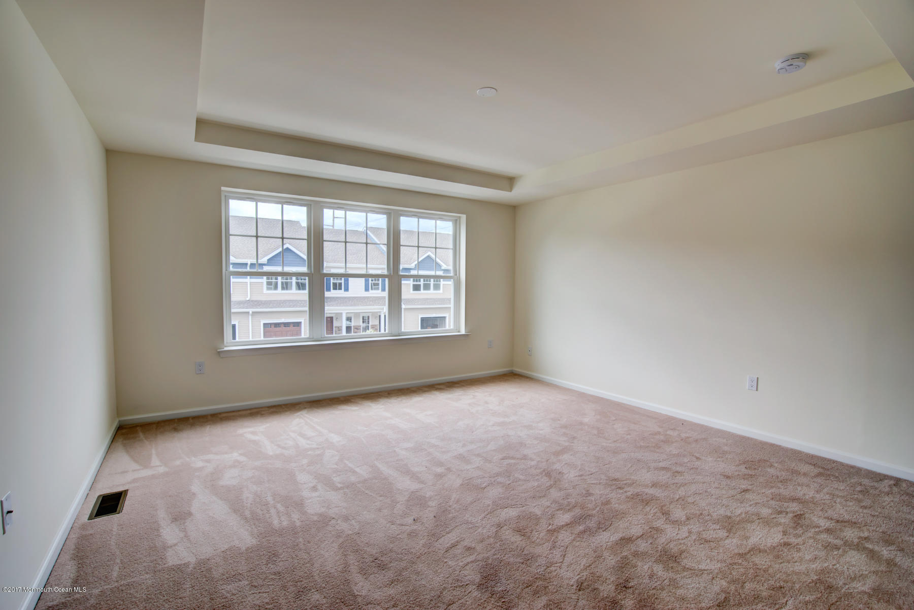 57 Rockingham Way Manchester Township, NJ 08759 - Photo 11 of 17 an empty room with windows