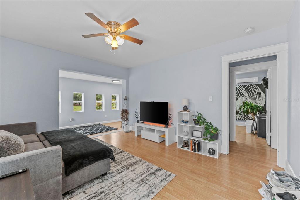 1326 17th Terrace North St. Petersburg, FL 33704 - Photo 14 of 28 a living room with furniture and a flat screen tv