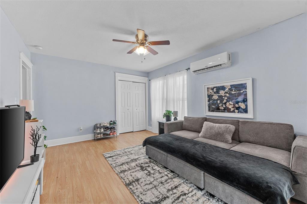 1326 17th Terrace North St. Petersburg, FL 33704 - Photo 15 of 28 a living room with a couch and a rug