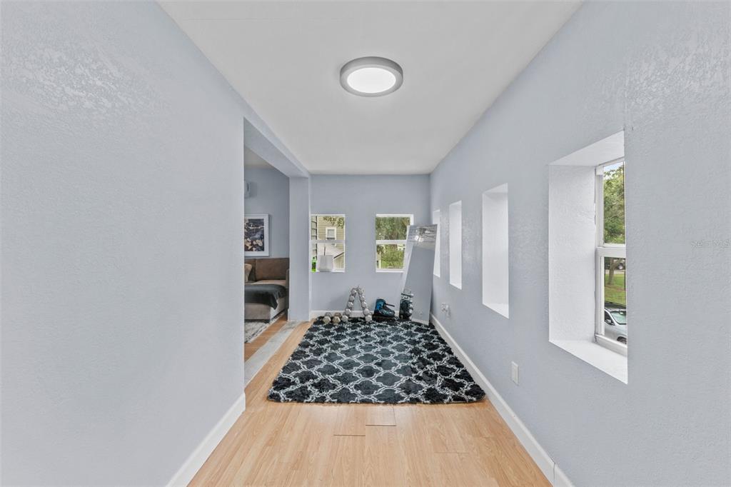 1326 17th Terrace North St. Petersburg, FL 33704 - Photo 17 of 28 a bedroom with a bed and a window