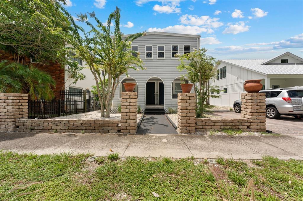 1326 17th Terrace North St. Petersburg, FL 33704 - Photo 2 of 28 a front view of a house with garden