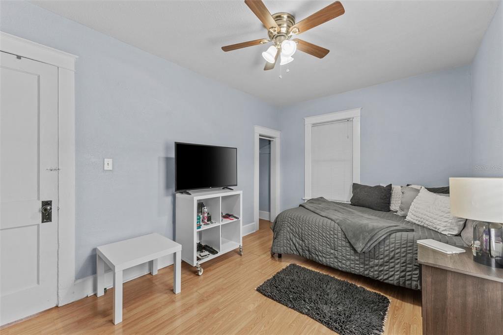 1326 17th Terrace North St. Petersburg, FL 33704 - Photo 22 of 28 a bedroom with a bed and a flat screen tv