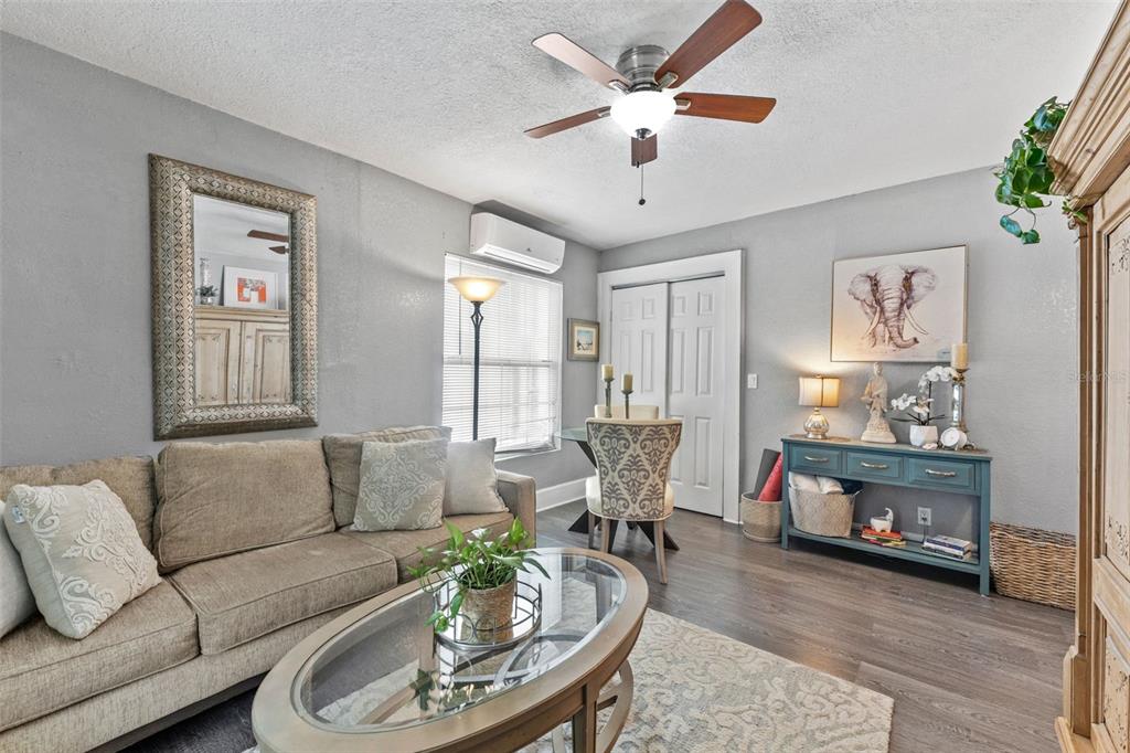 1326 17th Terrace North St. Petersburg, FL 33704 - Photo 4 of 28 a living room with furniture and a fireplace