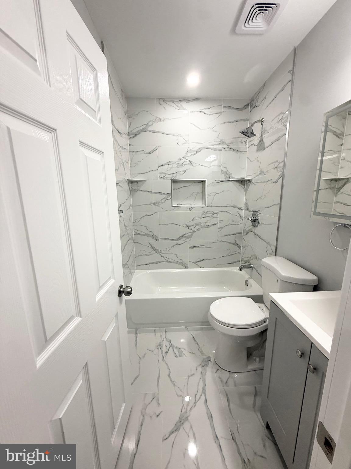 355 East Loudon Street Philadelphia, PA 19120 - Photo 22 of 30 a bathroom with a toilet and a shower