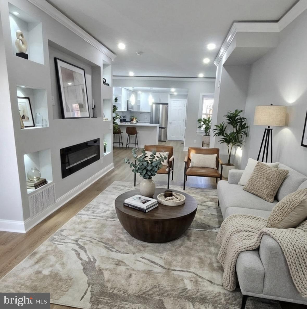 355 East Loudon Street Philadelphia, PA 19120 - Photo 29 of 30 a living room with furniture and a fireplace