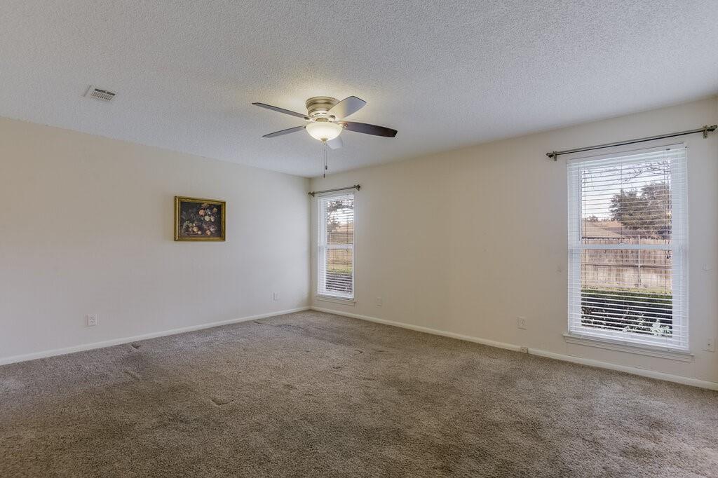1609 Delta Drive Arlington, TX 76012 - Photo 16 of 28 a view of an empty room with a window