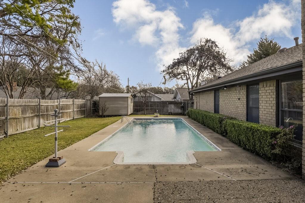 1609 Delta Drive Arlington, TX 76012 - Photo 25 of 28 a view of a backyard with swimming pool