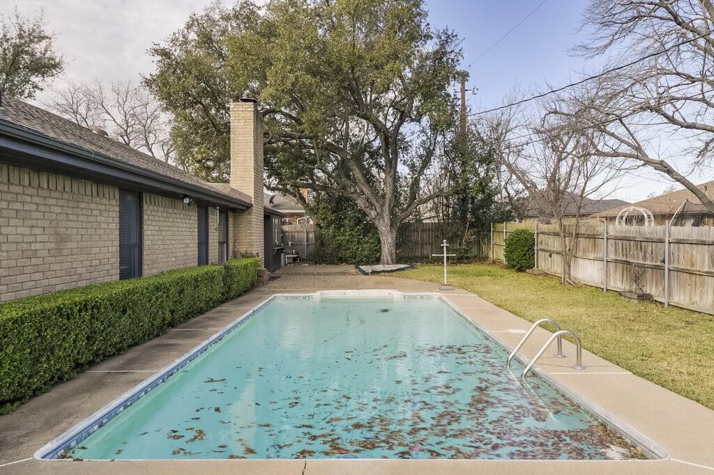 1609 Delta Drive Arlington, TX 76012 - Photo 26 of 28 a view of a backyard with large trees