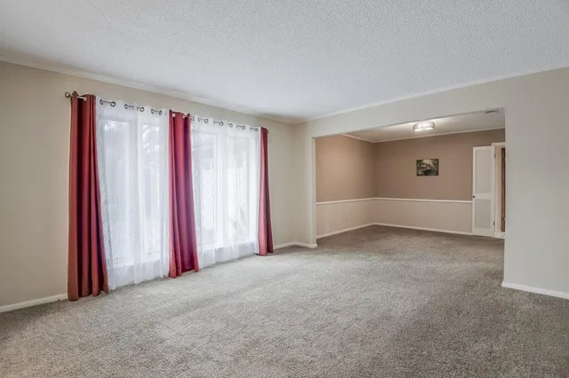 a view of a livingroom with a staircase