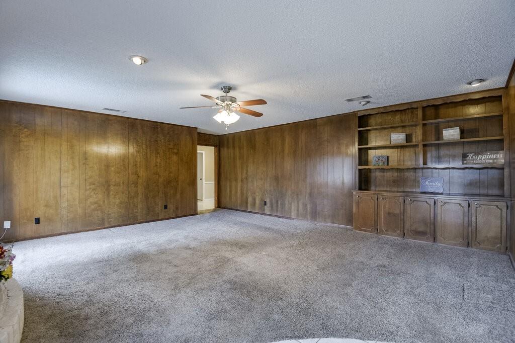 1609 Delta Drive Arlington, TX 76012 - Photo 8 of 28 a view of an empty room with a fireplace