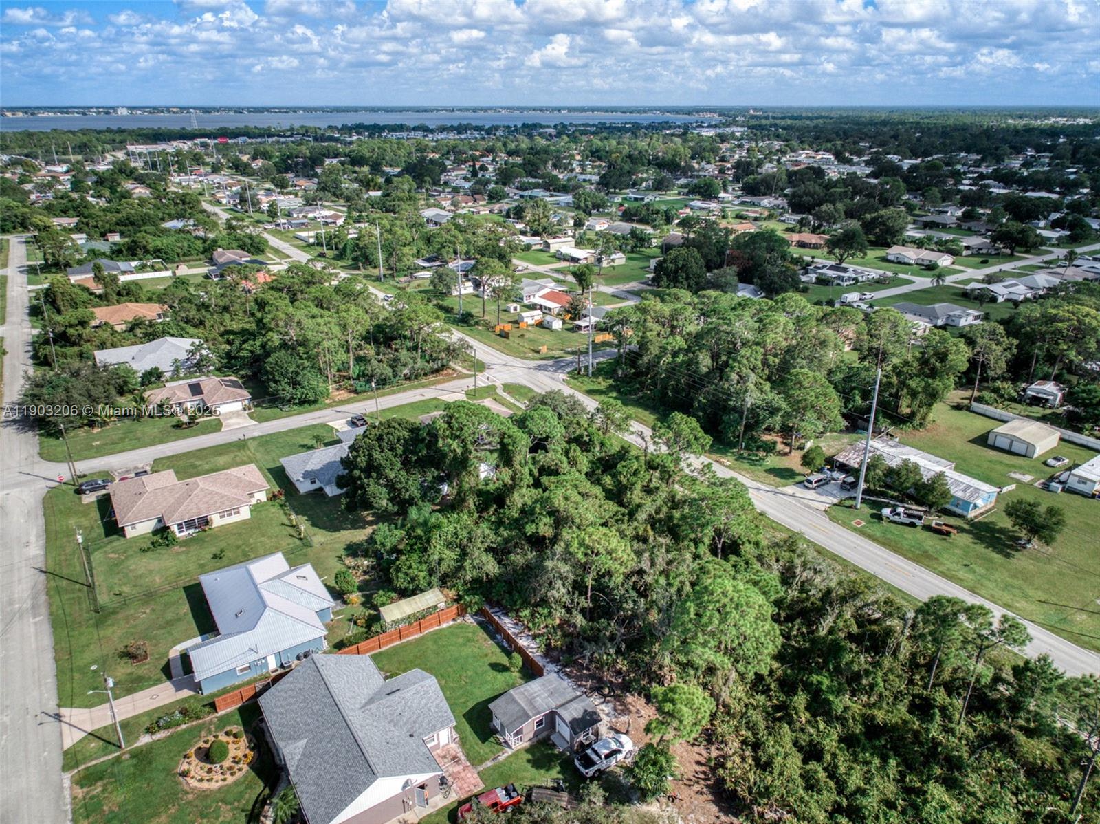 3208 Thunderbird Road Sebring, FL 33872 - Photo 3 of 5 an aerial view of a house with a yard