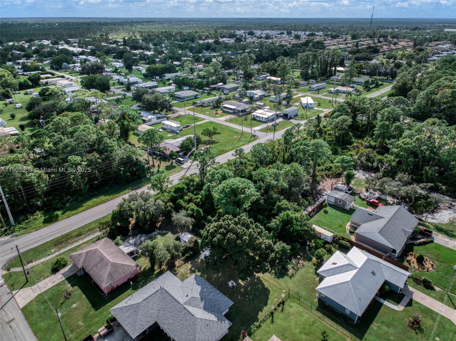 3208 Thunderbird Road Sebring, FL 33872 - Photo 4 of 5 an aerial view of residential houses with outdoor space